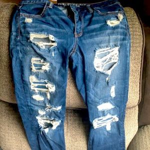 American Eagle size 8 jegging crop jeans. Dark wash destroyed denim